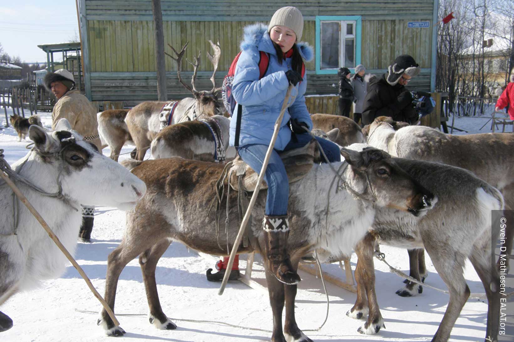 Young Yakut preparing to head out on the land