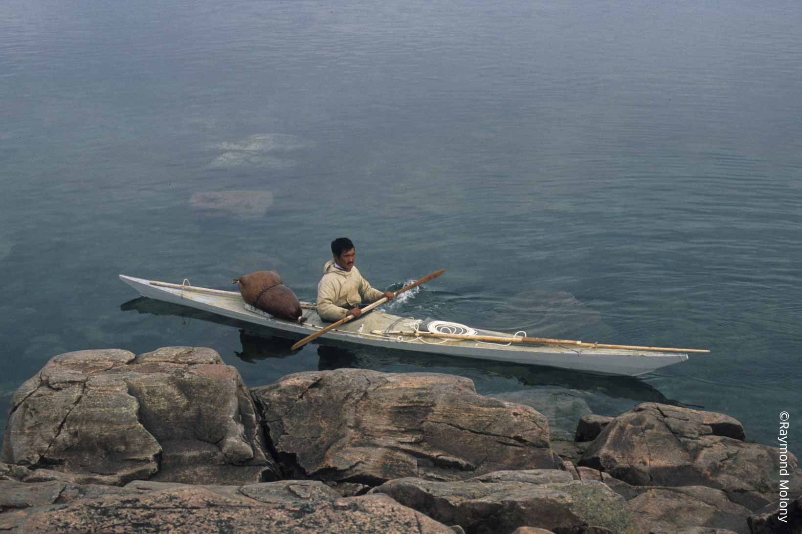Inuit hunter in kayak