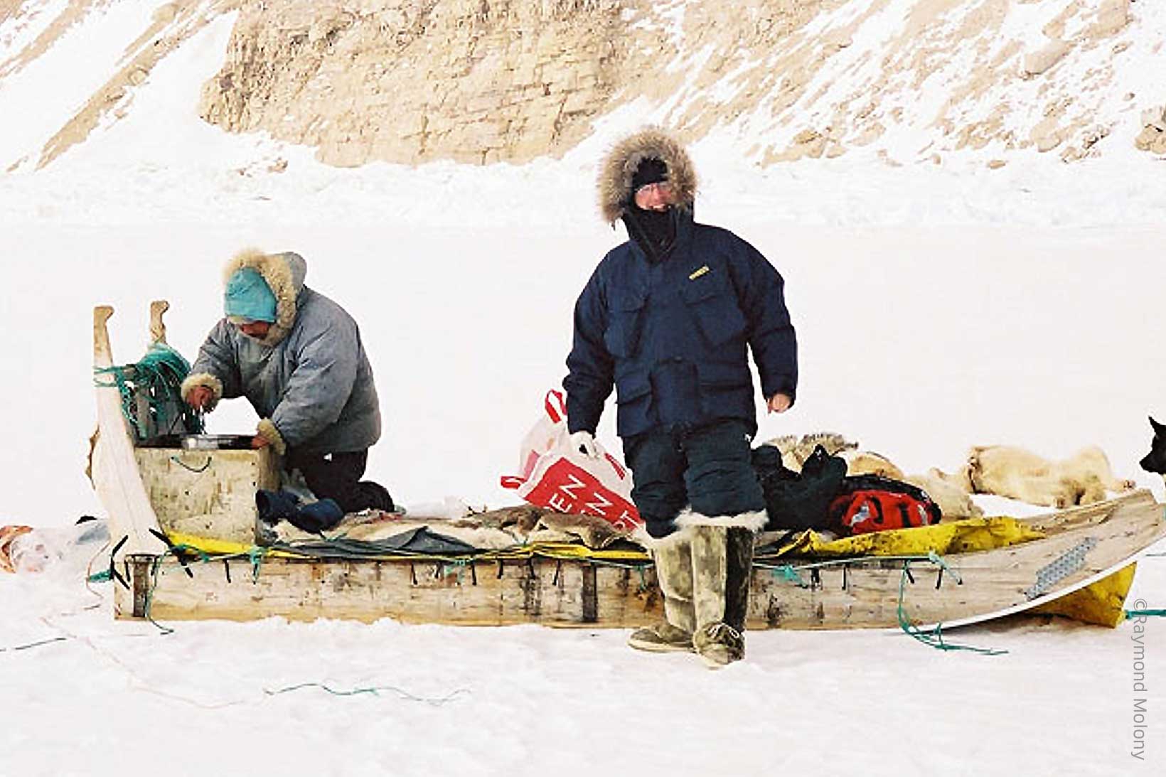 Two men on sledge